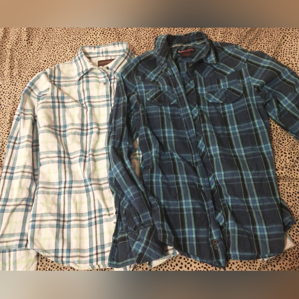 Two flannel shirts